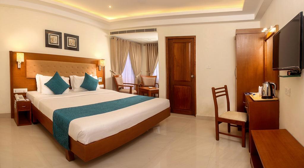 Hotel Vishnu Inn Guruvayur Room photo